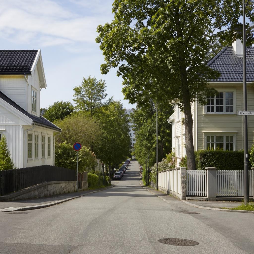 Rolig boliggate på Vinderen i Oslo med hvite og lyse trehus